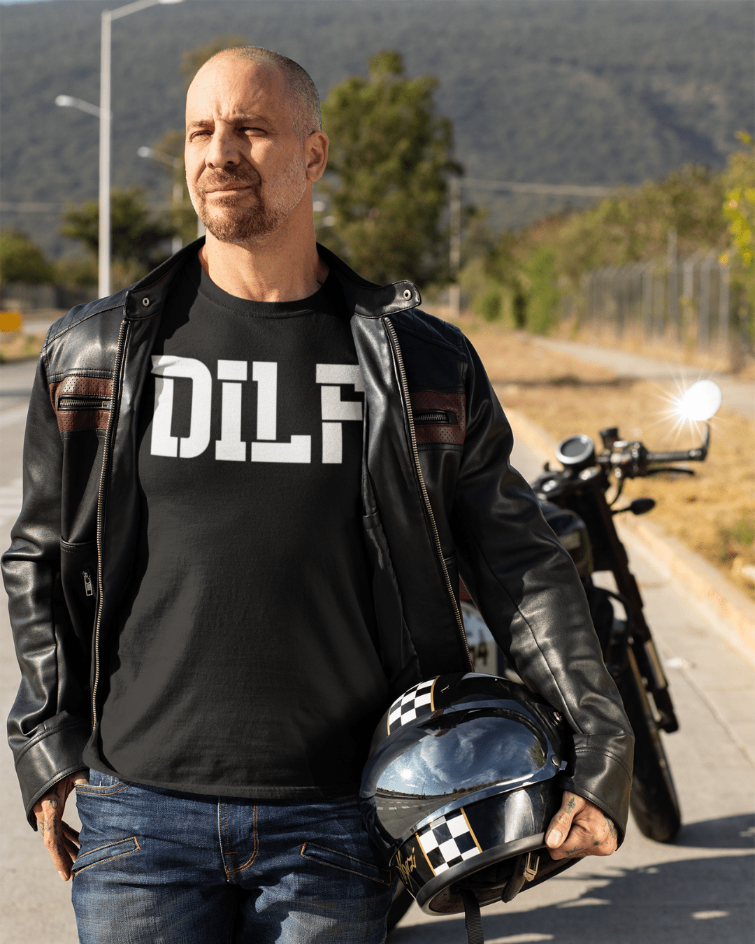 man wearing funny t-shirt which reads "DILF"