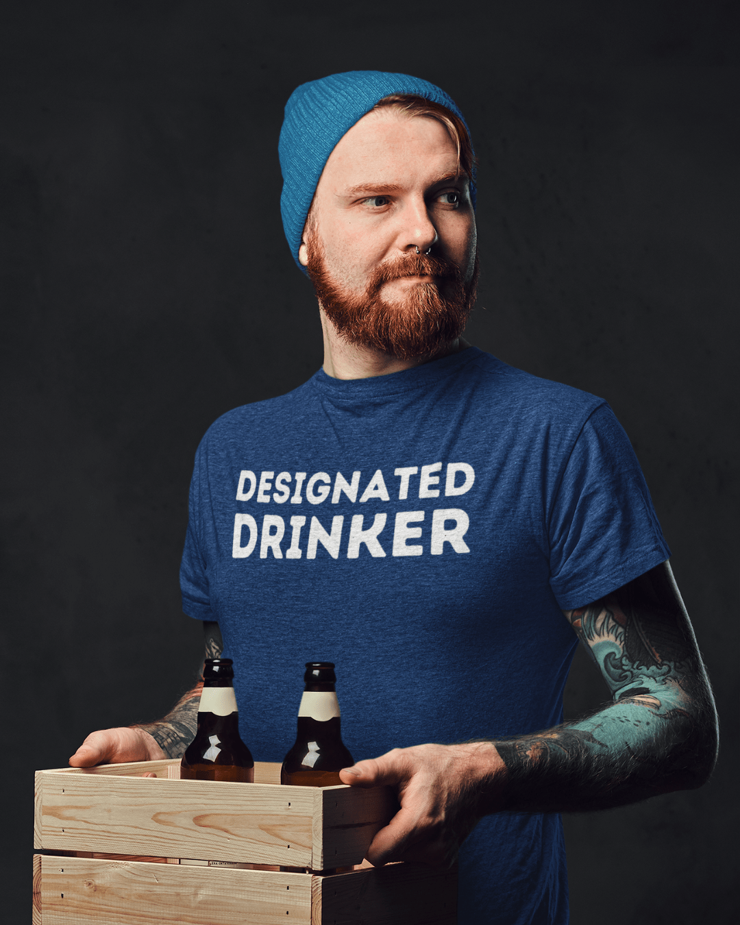 man wearing funny slogan t-shirt which reads "designated drinker"