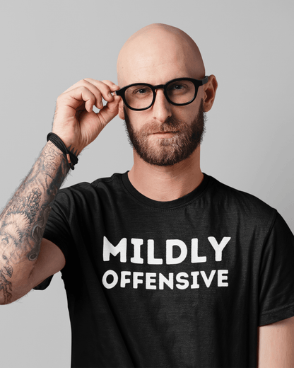 man wearing funny slogan t-shirt which reads "mildly offensive"